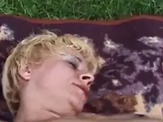 Mature blonde skank in red lingerie fucks herself