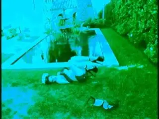 A gorgeous and scantily clad burlesque beauty poses for the camera