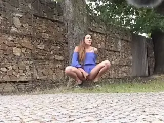 Hot woman Pissing In Public