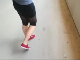 Girlfriend has to pee and wets her Leggings on parking deck