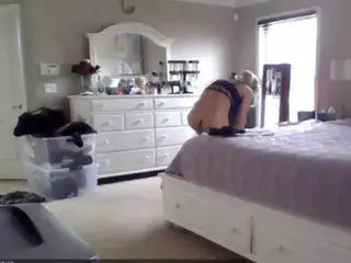 Blonde on bedroom cam changing