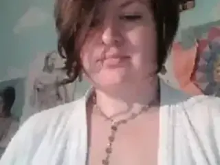 Milf playing with her chubby belly