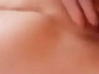 Rubbing her pussy