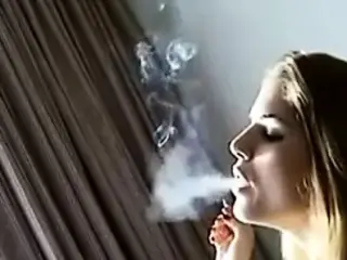 Sexy Blonde smoking with awesome inhales!