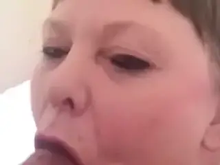 Mature slut giving blowjob