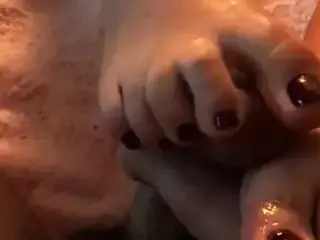 POV footjob cumshot on red toes