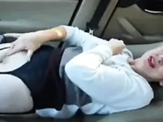 Beautiful granny masturbates in her car