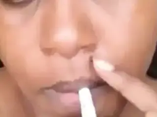 Kenian slut Aisha smoking cigarette hot