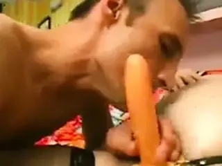 Guy sucks and takes chunky slut's strap-on on couch