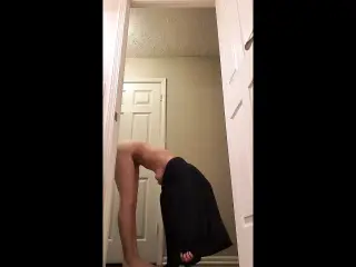 Fit girl doing handstands and showing off her big tits