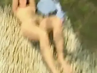 Surprising naked girl at a sunbath