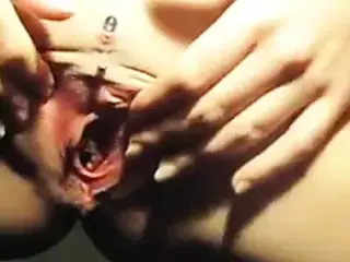 Pierced cunt masturbation