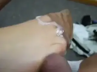 Cumming on her nylon feet