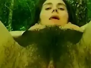 Hairy mature mastubates in the woods