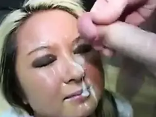 UK oriental teen takes facials in a bukkake party