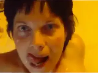 Mature wife sucks, jerks facial on herself