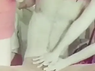 Three on a rotating bed