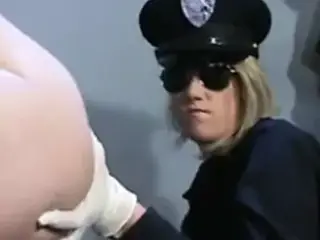 Lesbian Agent examining the Holes of the Prisoner