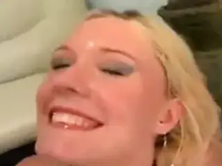 Blonde gets multiple facials in the gangbang blowbang