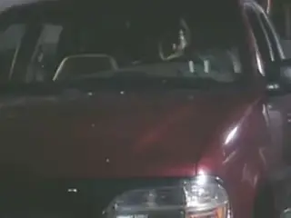 Blonde MILF blows a guy in car