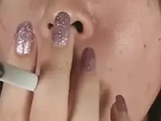 Close-up of Japanese girl smoking