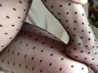 Louise in spotty tights and high heels for work