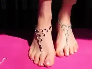 Mature lady with some beautiful high arches!
