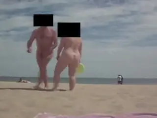 Mr & Mrs Voyeurist00 on Studland Naturist Beach, Frizbeeing