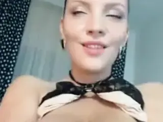 Busty Brunette Shows Her Assests On Cam