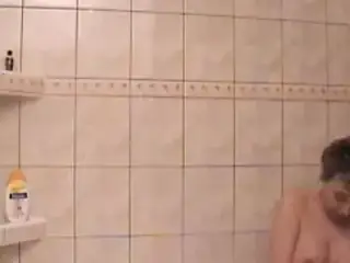 Anna masturbate on the shower with a dildo
