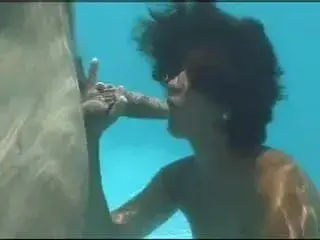 Underwater orgy oral sex!