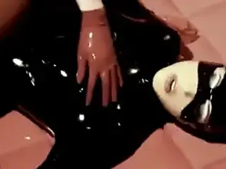 Rubber Catfight In Rubber Cell