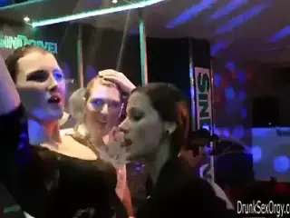 Wet girls dancing erotically in a club