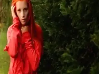 Orange haired beauty rubs herself