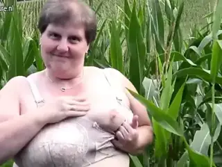 Old fat BBW mother fucks herself outdoor