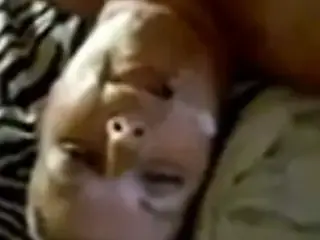 Some slut getting a facial