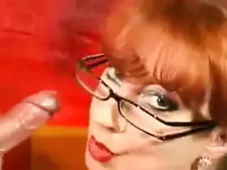 Redhead milf gives  blowjob