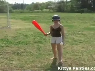 Innocent 18yo teen playing baseball outdoors