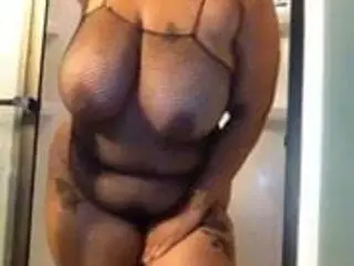 Plump babe taking a shower