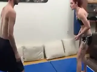 Rina makes tap out to her wimpy opponent