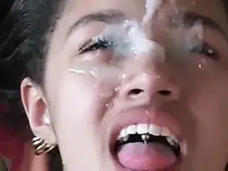 Cute black girl covered in cum