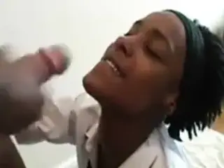 Brtish ebony babe sucks dick in her first bukkake