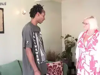 Busty British granny takes young black cock