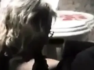 Blonde granny with saggy boobs.