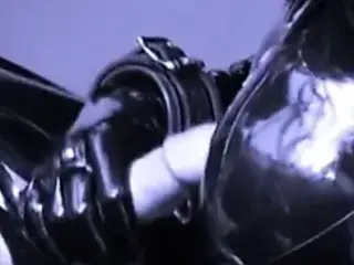 Dominatrix latex slaves