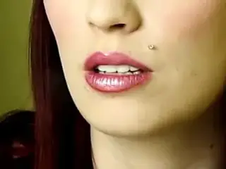 attractive woman smoking a cigarette up close