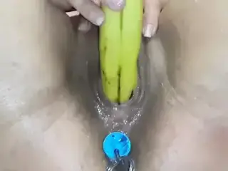 Amateur Milf Squirting fucking a Banana with Anal Beads