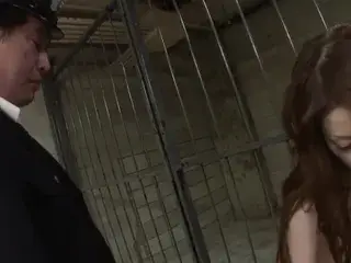 Saucy gives guard a blowjob through the bars