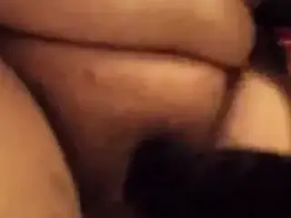 Latina and wine bottle