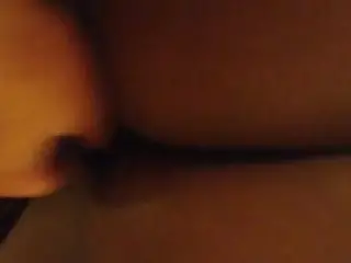 Giving her the butt plug